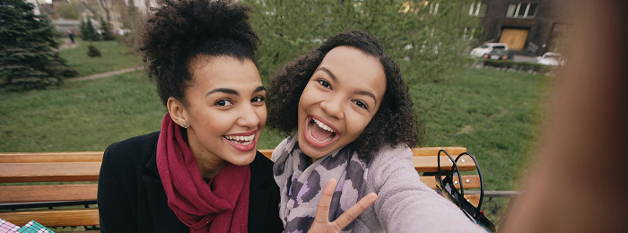 smiling women in Brooklyn happy about their cosmetic density treatments